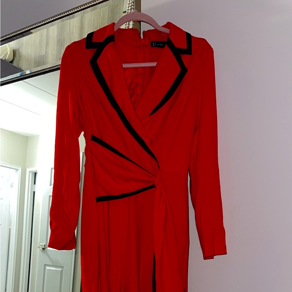 Red blazer jumpsuit with black trim